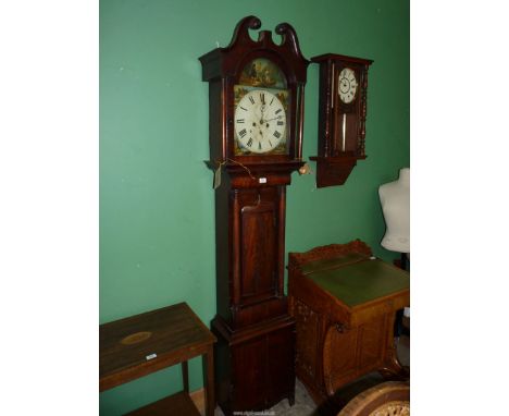 An attractive Mahogany cased longcase Clock having a swan pediment, the arched painted face having a scene of a Scots couple 