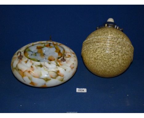 A green, orange and white glass marble effect 'Flycatcher' ceiling light shade and a globular caramel mottled hanging pendant