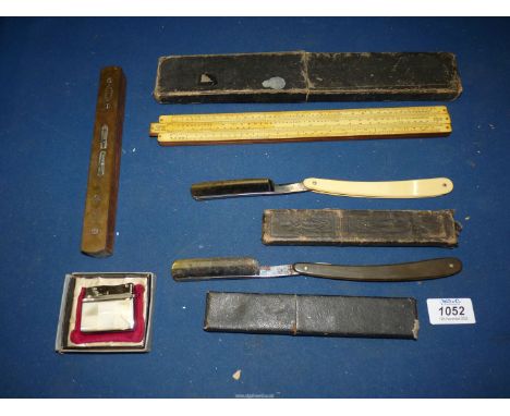 A quantity of miscellanea to include a boxed slide ruler, two cut throat razors, brass spirit level and a boxed Sarome gas li