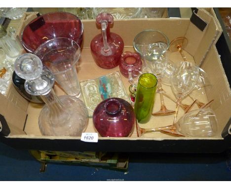 A quantity of glass including cranberry footed bowl, black vase, pink stem wine glasses, decanter etc.