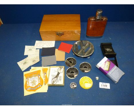 A wooden Cigar Box, hip flask, ''Slip n' snip'' scissors, Zippo lighter, Westfield badges and VW plastic car badges.