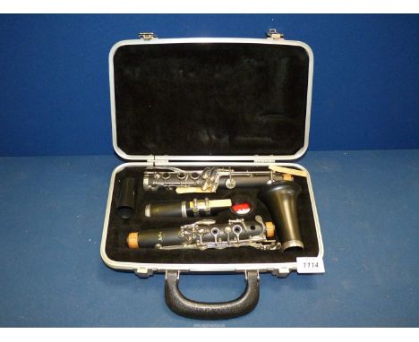 An Artley 17'' Clarinet in original carrying case.
