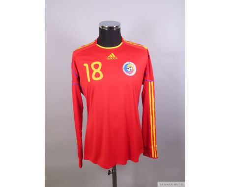 Marius Niculae red Romania No.18 away shirt, 2010,
player issue, Adidas, size XL, long-sleeved with country emblem, reverse l