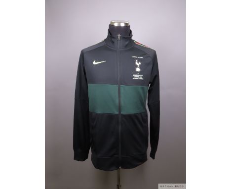 Black and green Tottenham Hotspur tracksuit top Caribou Cup Final 2021, Nike M
crew neck collar, zip up front and pockets wit