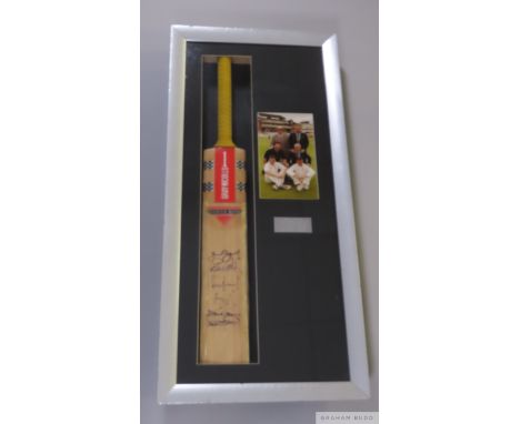 Cricket bat signed by six of Englands Captains, whom all played over 100 Tests matches,
signatures comprising A Stewart, M At