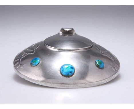 ARCHIBALD KNOX (1864-1933) FOR LIBERTY & CO, A TUDRIC PEWTER AND ENAMEL INKWELL  of squat circular form, plain hinged cover a