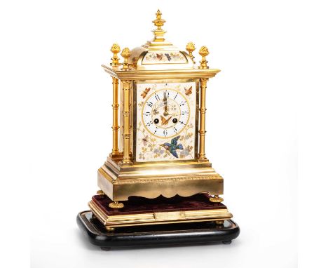 A FRENCH 'JAPONISME' GILT-METAL MANTEL CLOCK, CURTIS & HORSPOOL, PARIS, LATE 19TH CENTURY the caddy top with four flaming fin