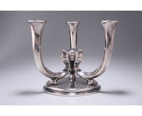 A WMF SILVER-PLATED CANDELABRA, CIRCA 1938 the three sinuous branches meeting in the centre around a sphere, raised on a circ