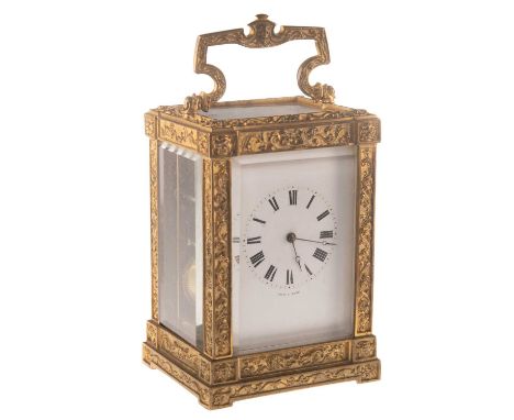 AN EARLY GILT-BRASS CARRIAGE CLOCK, BY JULES, PARIS, CIRCA 1840  no. 542, the case cast with scrollwork, the escapement dense