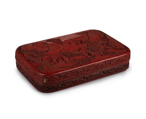 A CHINESE CARVED RED CINNABAR LACQUER BOX, 18TH/19TH CENTURY of rectangular form with rounded corners, the lift-off lid carve