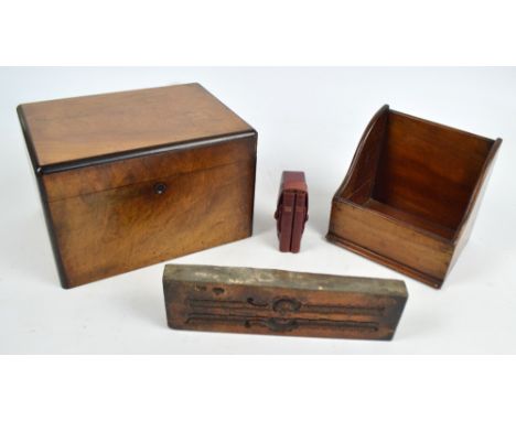 A small walnut box with push button catch, width 27cm, a small mahogany letter rack, width 18cm, a wooden mould for decorativ