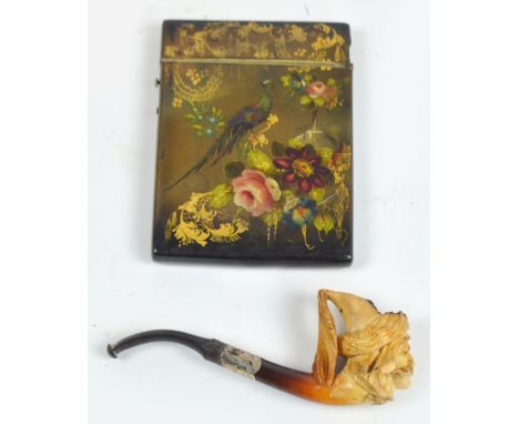 A small cased 19th century Meerschaum pipe carved as a man with a large moustache in Eastern headgear, with a white metal mou