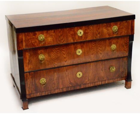 A 19th century Biedermeier Hungarian ash and ebonised three drawer commode with brass ring drops and square section feet, wid