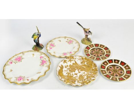 A collection of Royal Crown Derby comprising a pair of Imari pattern 1128 tea plates, two fluted edge "Royal Pinxton Roses" p