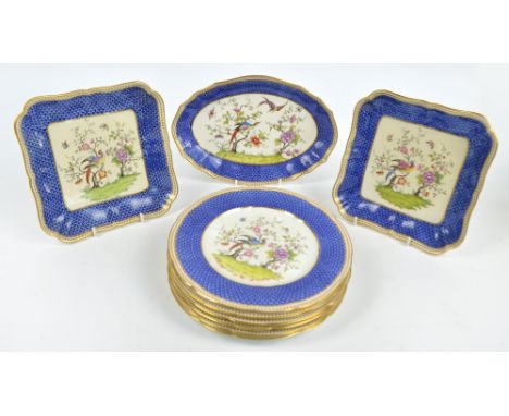 A Spode Copeland part dessert set in peacock, flower and butterfly pattern with gilt heightened blue scale edge comprising si