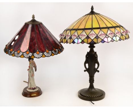 A reproduction Tiffany style table lamp and a further figural table lamp with Tiffany style shade (2).