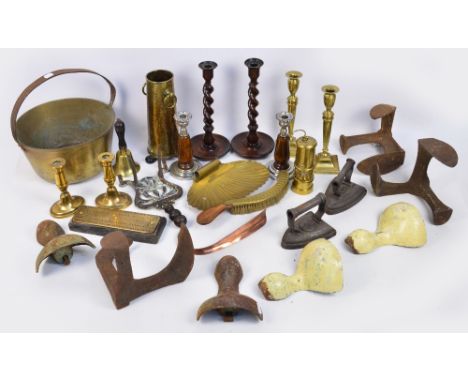 A brass jam pan, two pairs of candlesticks, cribbage board, a bell, a late Victorian oil lamp (damaged), various funnels, sho