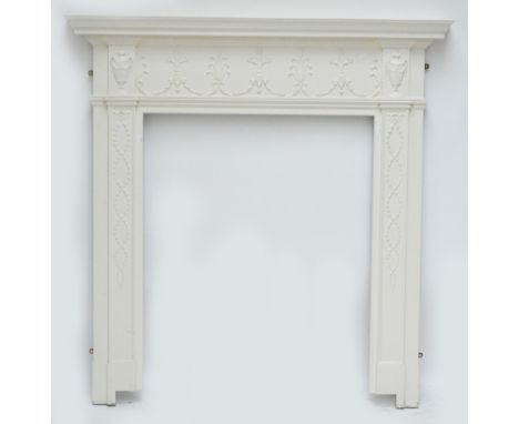 A white painted fire surround, internal width 84cm, width of mantel 140cm.