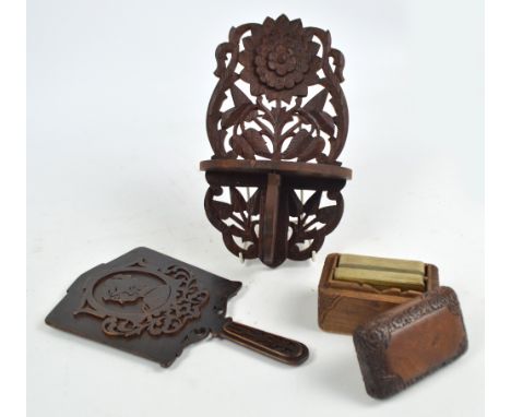 A Victorian fretwork wooden hand mirror with rectangular bevelled plate with decoration of a lady's bust silhouette, height 3