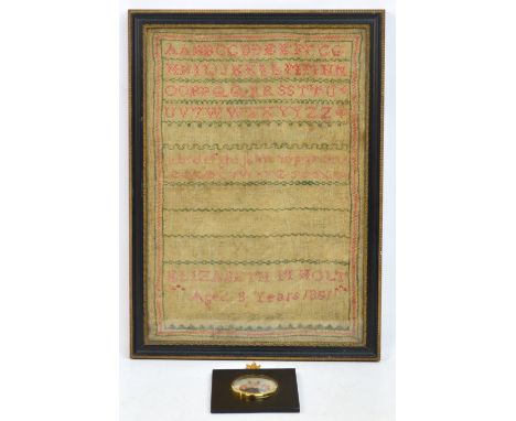 A mid 19th century alphabetic sampler worked by "Elizabeth M Holt aged 8 years 1851", 43.5 x 30cm, framed and glazed and an o