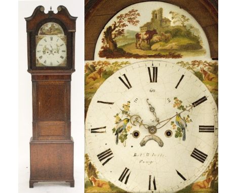 A 19th century oak and mahogany crossbanded longcase clock, the hood with broken swan neck pediment above a painted arched di