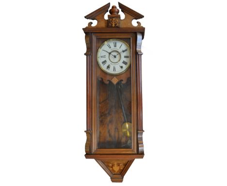 A late 19th century walnut and stained beech wall clock with inlaid broken pediment gallery, reeded columns sides and inlaid 