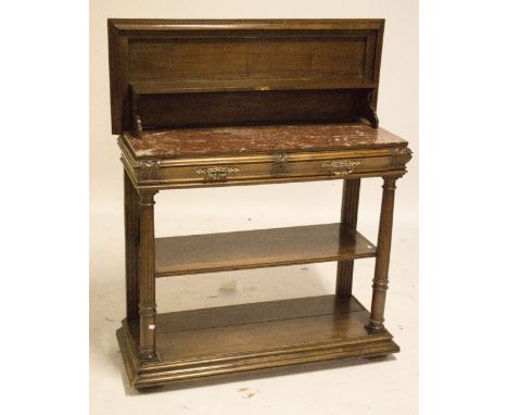 A Continental c.1900 buffet, the hinged rising lid enclosing rouge marble shelf, two frieze drawers, fluted uprights and plin