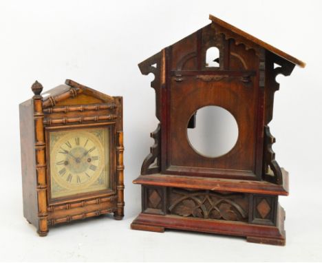 A late 19th century German simulated bamboo striking mantel clock, height 32.5cm and a Black Forest cuckoo clock case, height