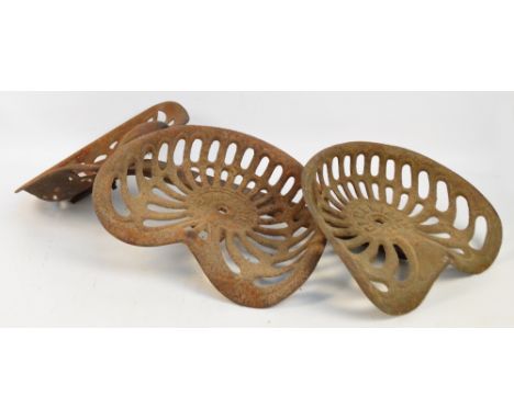 Three vintage tractor seats; Cambrian, Bamfords and Pierce.