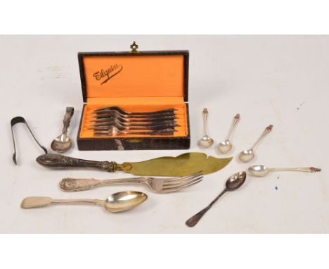 A small collection of silver items comprising a set of four hallmarked silver coronation coffee spoons, each with a crest and