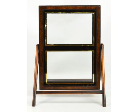 An early 20th century walnut framed cigar display case, glazed and painted to both sides, on easel type frame, height includi