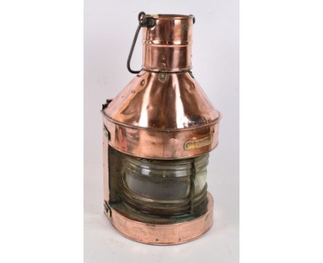 A late 19th century copper mast head ship's lamp, height 60cm (af). CONDITION REPORT: There is a large crack to the glass, na