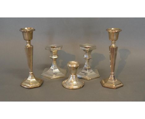 A Pair Of Birmingham Silver Hexagonal Squat Candlesticks, together with a pair of Chester silver candlesticks and a Birmingha