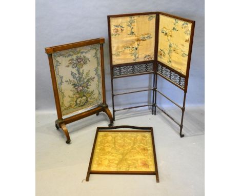 A 19th Century Mahogany Two Fold Screen With Needlework Panels, together with a rosewood fire screen and another similar 