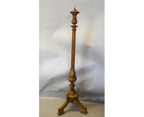 A Late 19th Early 20th Century Gilded Lamp Standard in the 18th Century Style with a reeded column, raised upon out swept leg