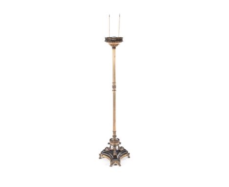 A BRASS STANDING LAMP the reeded column surmounted by an acanthus leaf and pierced collar, on an acanthus leaf pedestal, supp