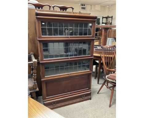 A Globe Wernicke 5 tier bookcase with 3 leaded glass sections. 146cm x 86cm