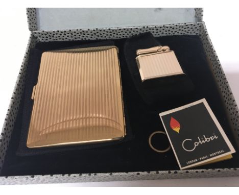 A Vintage unused Colibri lighter and cigarette case in a fitted presentation box.