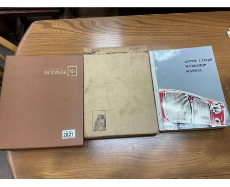 A 1973 Triumph Stag repair manual together with a 1965 edition Rover 3 Litre workshop manual. With original card sleeve.