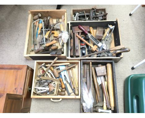 Large collection hand tools including saws - hammers - planes - chisels - clamps.