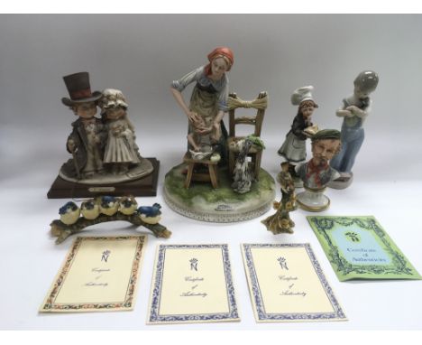 Six Capodimonte figures, some with certificates and a Lladro figure of a young boy.