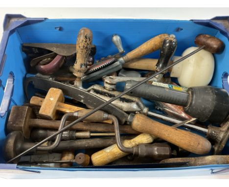A box of mixed workshop tools.