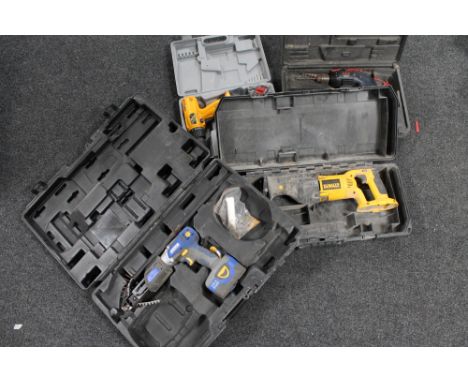 Four cased power tools to include 12V cordless drill, AED 9.6v drill, Jewsons nail gun and a Dewalt hand saw (no battery)