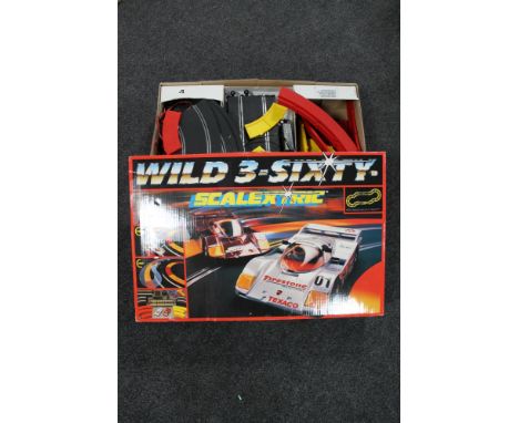 A boxed Scalextric Wild 3-Sixty race set  CONDITION REPORT: This item looks in good condition with very little signs of use a