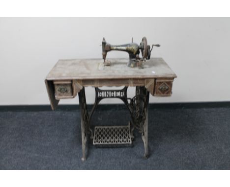 A vintage treadle sewing machine in table 