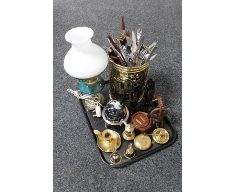 A tray of brass and china electric oil lamp with shade, brass embossed stick pot, large quantity of plated cutlery, miniature