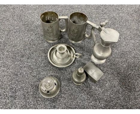 A basket of antique pewter ware - candlestick, snuff box, salt seller, ink well etc 