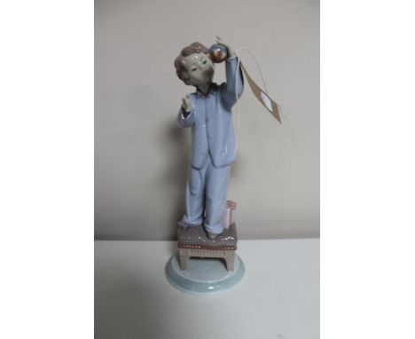 A Lladro figure A Night Before Christmas