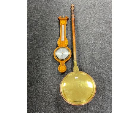 An inlaid mahogany cased barometer and a 19th century brass and copper warming pan 