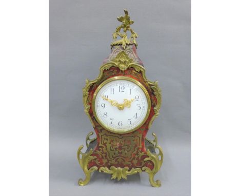 French boule work style clock with brass mounts, the enamel dial with Arabic numerals, 30cm high 